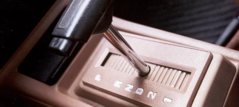 Person driving a car representing autonomy and control